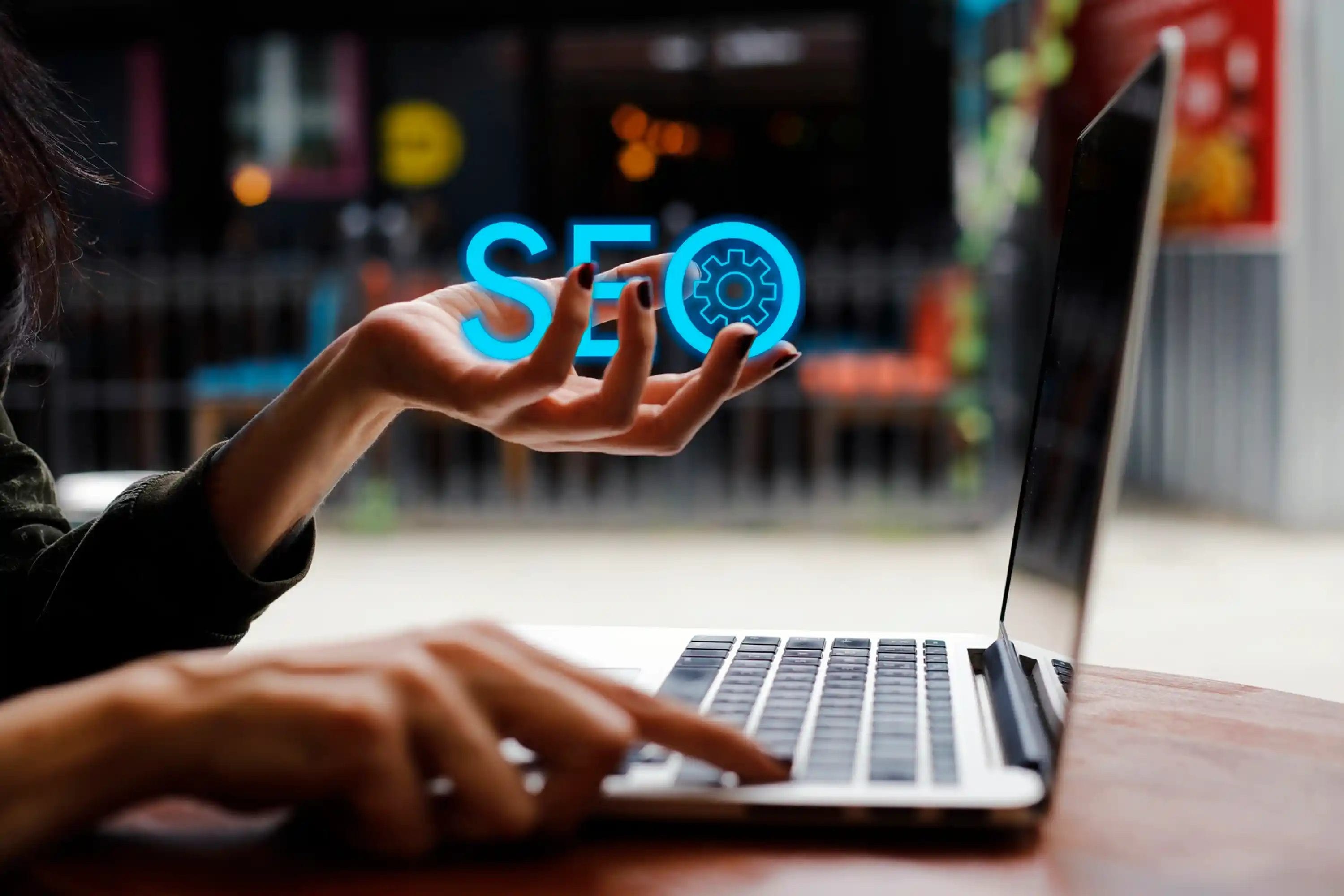 SEO consulting services helping businesses improve search rankings, website visibility, organic traffic, and digital growth through strategic SEO optimisation on a laptop workspace.