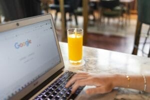 woman and laptop - ppc service in singapore